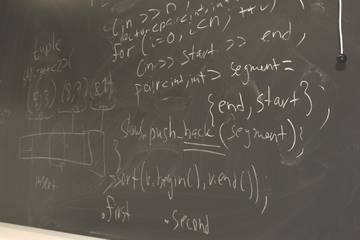 Picture of a blackboard containing code for scanline, Berne, higher brightness